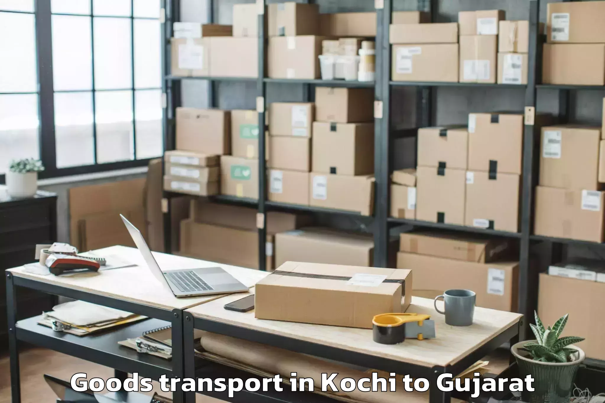 Top Kochi to Sachin Goods Transport Available